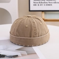 Detailed close-up of khaki docker hat showing cotton twill fabric and white stitching - M (56-58cm) / Khaki
