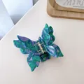 Elegant butterfly hair claw clip with green and purple acetate marble texture finish - Mixed Purple Green