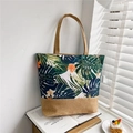 Linen tote bag with tropical leaf print and jute trim in a summer vacation style - Orange Patchwork