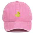 Detailed close-up of yellow duck embroidery on a washed pink cotton baseball cap - Pink