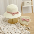 Detail of child straw sun hat and matching crossbody bag with pink polka dot bows - Milk White Hat + Bag