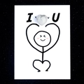 Polished white turquoise heart stone with grey veins on a creative I love U card - Howlite