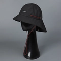 Detail of waterproof checkered nylon sun hat with red windproof drawstring and logo - M (56-58cm) / Black