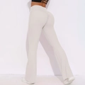 Detail van hoge taille yoga legging met uitlopende pijpen en push-up effect in crème kleur - S / Off-white grijs