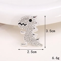 Macro view of crystal encrusted dinosaur charm with 3.5cm height and 2.5cm width - Silver Rhinestone Dinosaur