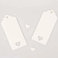 Close-up of white cardstock heart tags with scalloped edges and cutout heart design - Heart Cutout (No Twine) / White