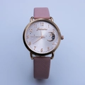 Women's quartz watch with pink leather strap, rose gold case, and moon star dial detail - Pink