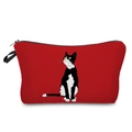 Dettaglio di un beauty case rosso con una simpatica stampa di gatto bianco e nero - Stile Gatto Mucca Che Guarda in Alto Rosso Brillante (hz3549)