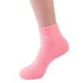 Fuffy coral fleece slipper socks for women in soft pink color on mannequin feet - Bright Pink