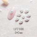 Charme d'ongle en perle ovale crème avec bordure argentée et taille de 5x7mm - Base Argent Blanc Perle (LF7108) / 5X7mm