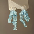 Close-up of light blue stone tassels and milky white circular base on forest style earrings - 62# Milky White Disc Irregular Light Blue Stone Tassel Style