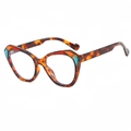 Cat eye sunglasses in dark tortoiseshell finish with colorful geometric pattern accents - Leopard Frame