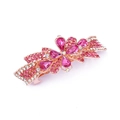 Close-up of rose gold bow hair clip with pink crystals and floral rhinestone details - Style E / Pink