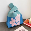Blue and green knitted tote bag with pink flowers, soft cotton handheld commute bag - Blue Background With Small Pink Flowers