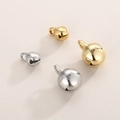 Vista dettagliata di piccoli campanellini in acciaio inox oro e argento per gioielli - 5mm / Color Acciaio