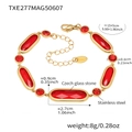 Detail view of gold-plated stainless steel bracelet with red rectangular glass stone - Red