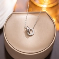 Silver Roman numeral double ring necklace with zircon pendant on a jewelry gift box - Silver