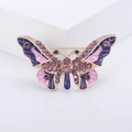 Squisita spilla a farfalla placcata in oro con smalto viola e strass scintillanti - Viola