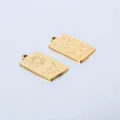 Detailed macro view of gold-plated rectangular Capricorn zodiac pendant in stainless steel - Capricorn