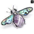 Vintage silver bee brooch featuring iridescent abalone shell wings and purple striped gemstone - Amethyst