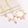 Golden stainless steel tulip and butterfly charm necklace and bracelet jewelry set - Necklace + Bracelet