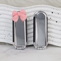 Portable silver folding mirror comb with pink bow detail and sleek rectangular design - Electroplated Silver (With Pink Bow Sticker)