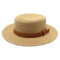 Detail of natural woven straw boater hat featuring a brown leather decorative band - Khaki