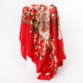 Close-up of red silk scarf with floral paisley print draped over a white minimalist block - 90x90cm / Red (D9026)