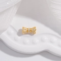 Dettaglio del ciondolo a fiocco dorato con zirconi per la creazione di gioielli - Medio: 4,4*8,4 mm / Oro