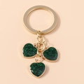 Golden heart keychain with three dark green glitter charms and polished metal rings - Small Heart / Green