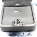 Minimalist S925 sterling silver skull and bone open ring displayed on velvet box - Adjustable Open / White Gold