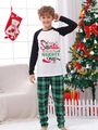 Dettaglio del pigiama natalizio per bambini con stampa Dear Santa e pantaloni a quadri - S / Stile Bambini