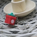 Christmas gift box keychain with red silicone cube and white 3D snowflake patterns - Small Christmas Soft Glue Keychain Gift Box