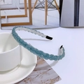Blue beaded braided headband with white fabric lining on a styled white background - Dark Blue