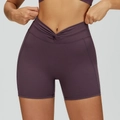 High waisted yoga shorts in deep purple with unique front twist knot detail and slim fit - XL / Grape Purple