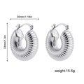Detailed view of silver ribbed C-shape earrings with size metrics 33mm and weight info - Ribbed/Shell Texture Style