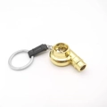 Golden turbocharger keychain with black leather strap and rotatable turbine blades - Gold