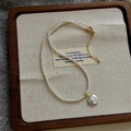 Elegant freshwater pearl bracelet with a heart-shaped pendant and golden clasp finish - Freshwater Heart Pearl Necklace