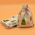 Christmas themed cotton drawstring sachet bag with reindeer and tree prints on beige fabric - Christmas Deer