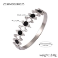 Brazalete calado hexagonal plateado con incrustación de acrílico negro en acero - Pulsera Color Acero