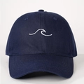 Close-up of white wave embroidery and stitching on deep blue cotton baseball cap - One Size / Navy Blue