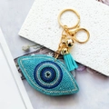 Sparkling blue heart evil eye bag charm with crystals and elegant silk tassel - Lake Blue Eye Gold Clasp