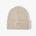 Oatmeal ribbed knit beanie featuring a tonal smiley face embroidery and folded cuff design - One Size / Beige