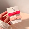 Pink and rose red matte bow hair clips set for girls on white display card - Matte Texture / Pink Bow 2-Pack