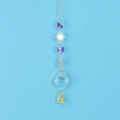 Detailed view of suncatcher with crystal beads, moon fairy charm, and gold metal accents - Rose Quartz
