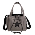 Gray canvas crossbody bag with large black star print and adjustable strap - Gray