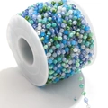 Colorful faceted crystal bead chain wrapped on a white spool for DIY jewelry making - Steel-Green Multi