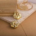 Textured hollow golden croissant earrings displayed on a rustic beige stone base - Layered Design (ZHE966)