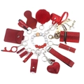 Portable 15-piece red rhinestone self-defense keychain set with plush ball and wristlet - Red
