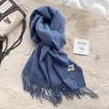 Solid blue soft cashmere-feel scarf with fringe tassels on beige plush background - 200*65cm / Melange Blue
